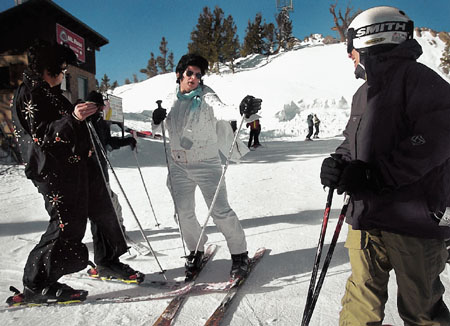 Daniel Smith, center, of San Jose, and his brother, Tom, of London, England, travel to Mt. Rose each year for the annual Elvis birthday celebration. (Scott Sady/RGJ)